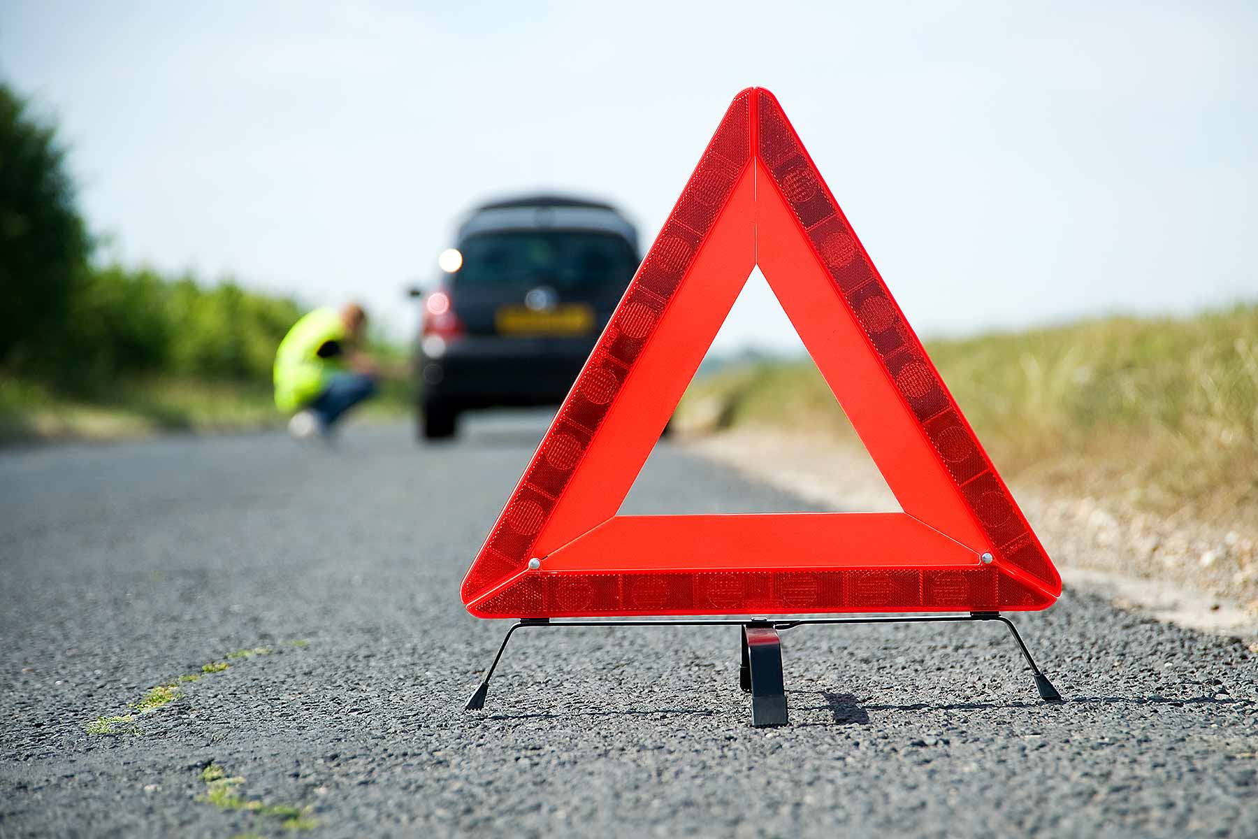 Broken down car in summer