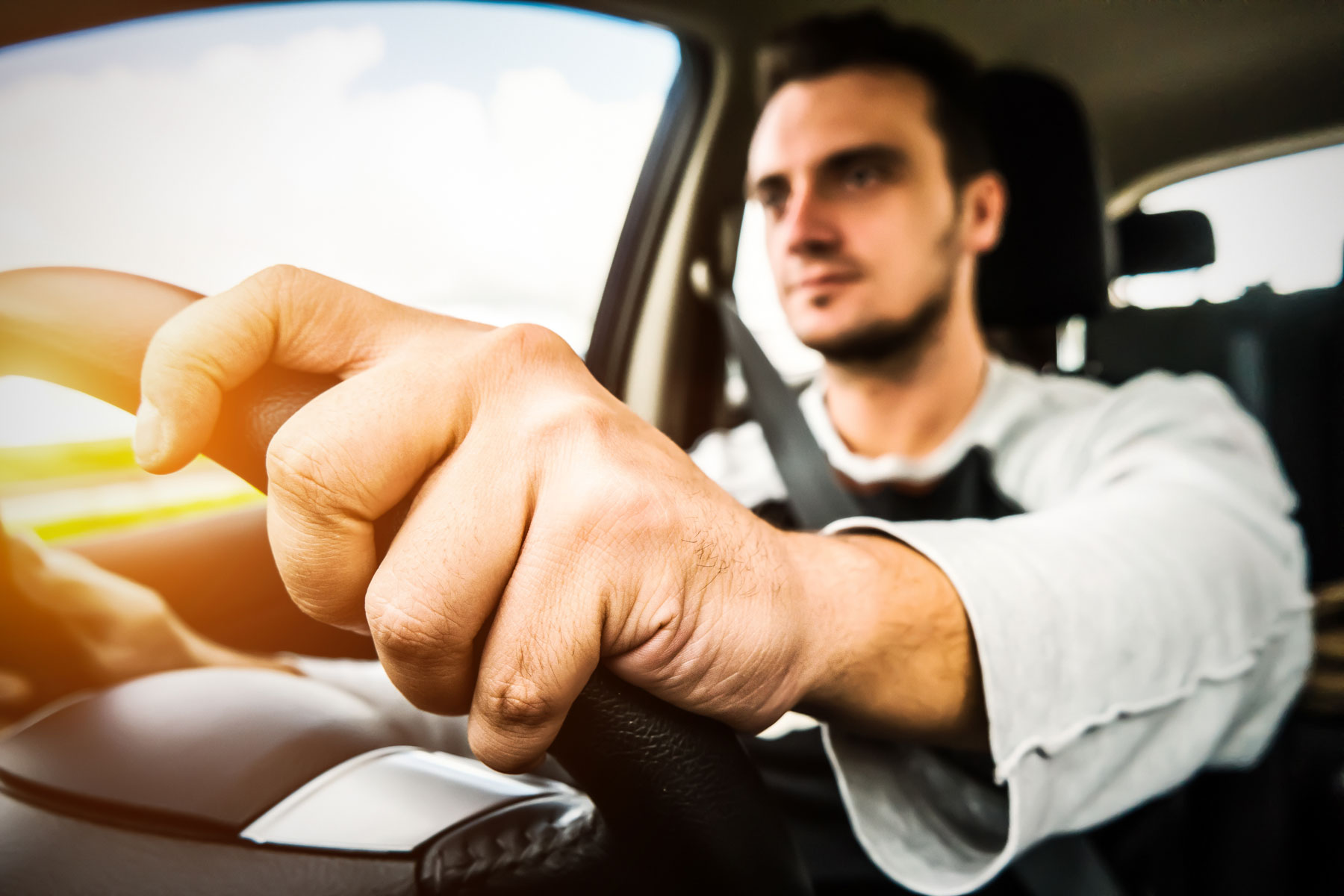 Man driving a car