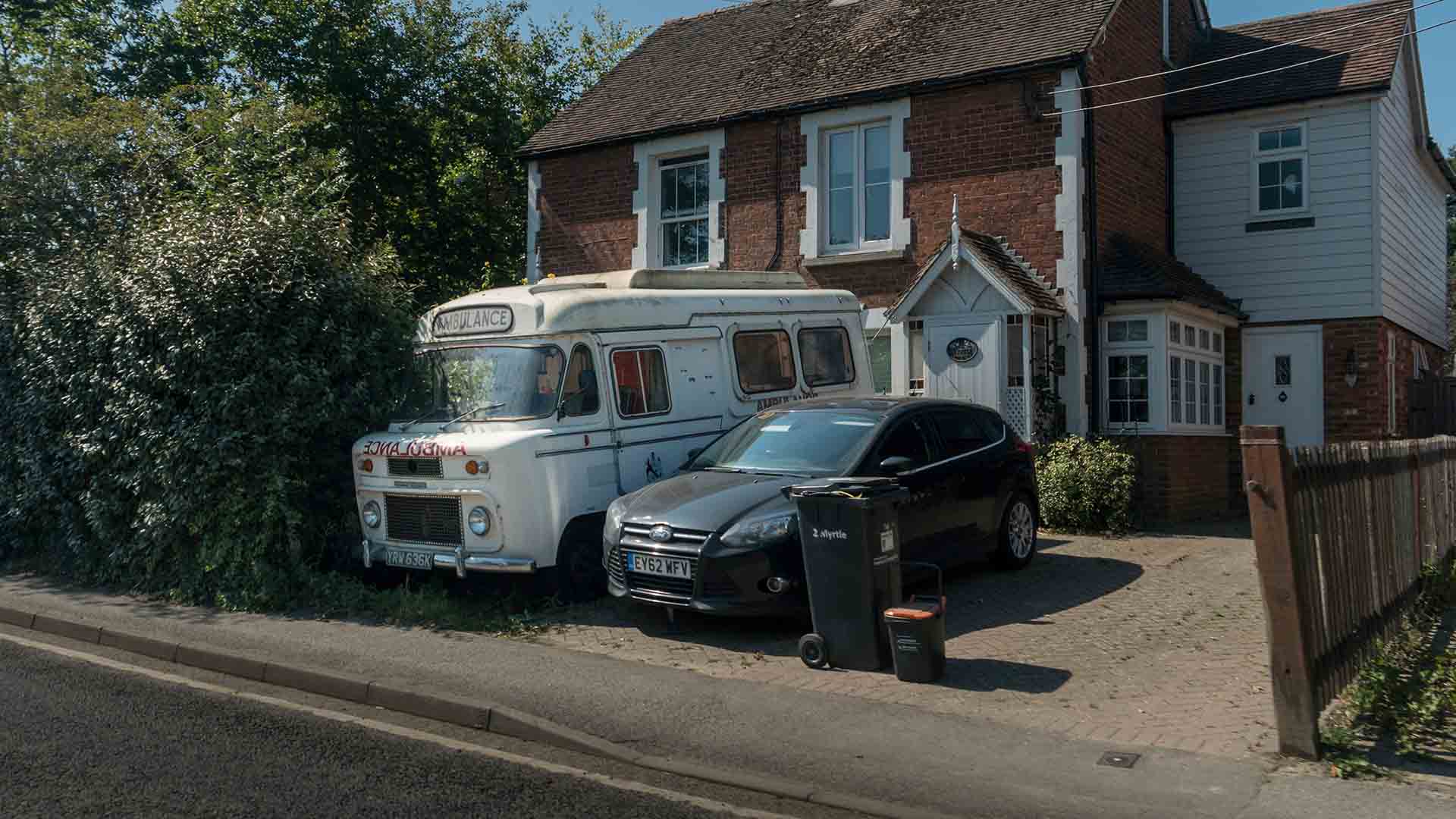 Vehicles parked on driveway