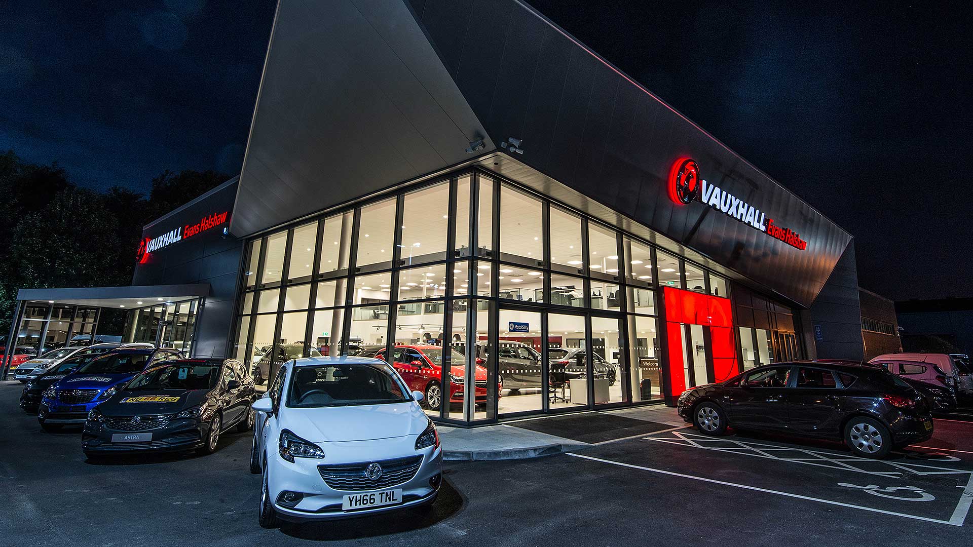 Vauxhall UK car dealer at night