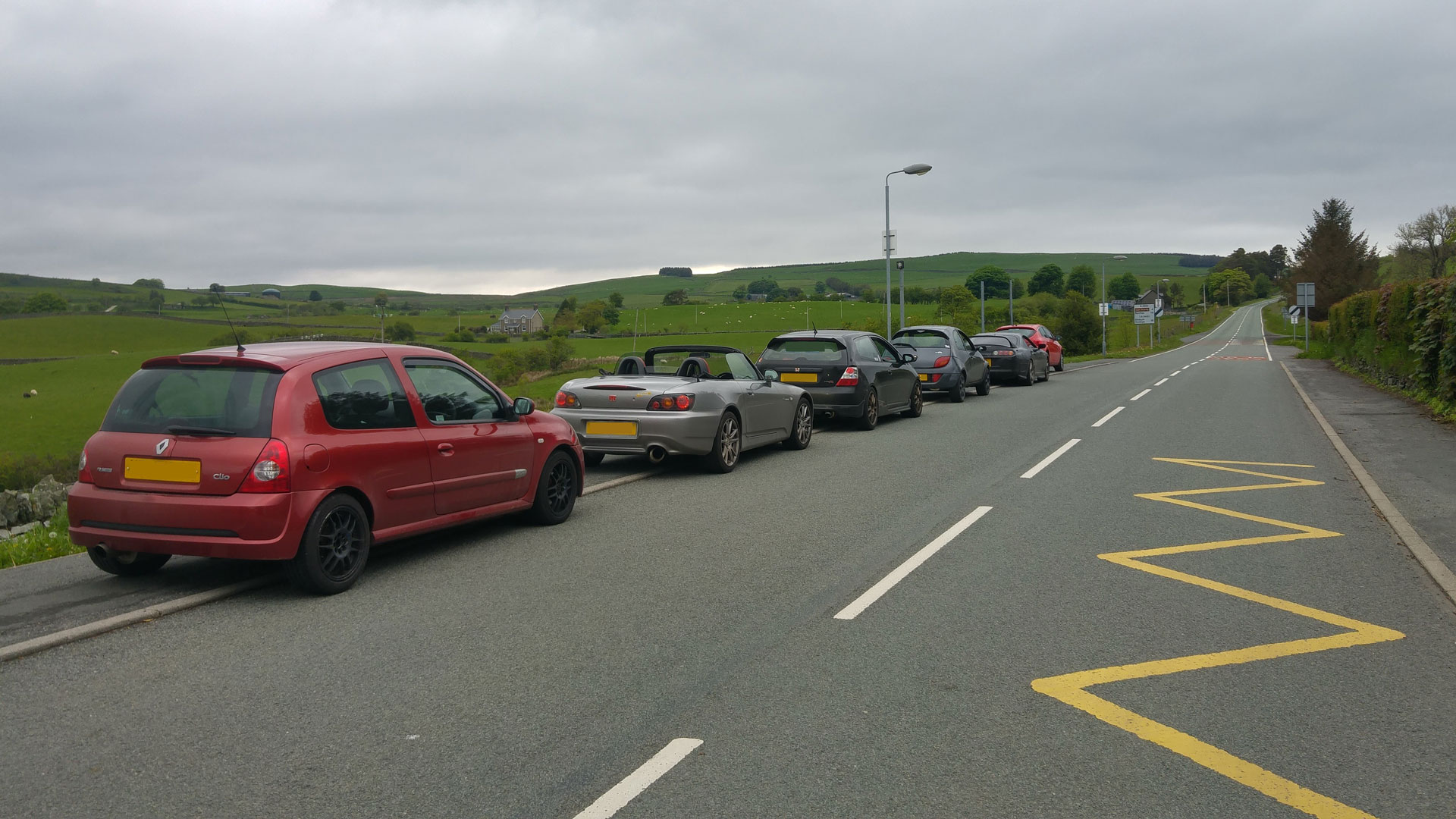 cars line up for evo triangle