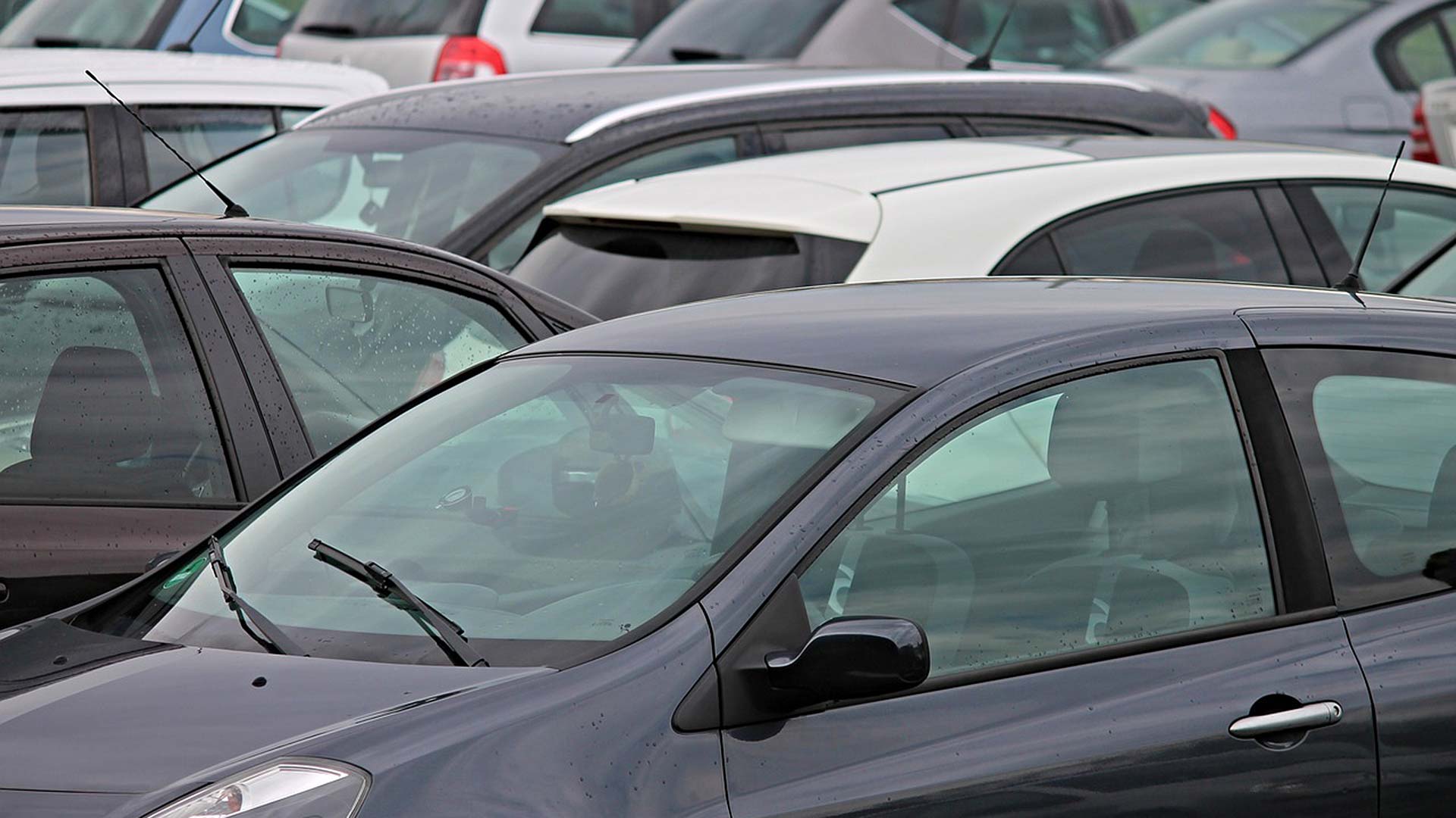 Vehicles in a closely-packed car park