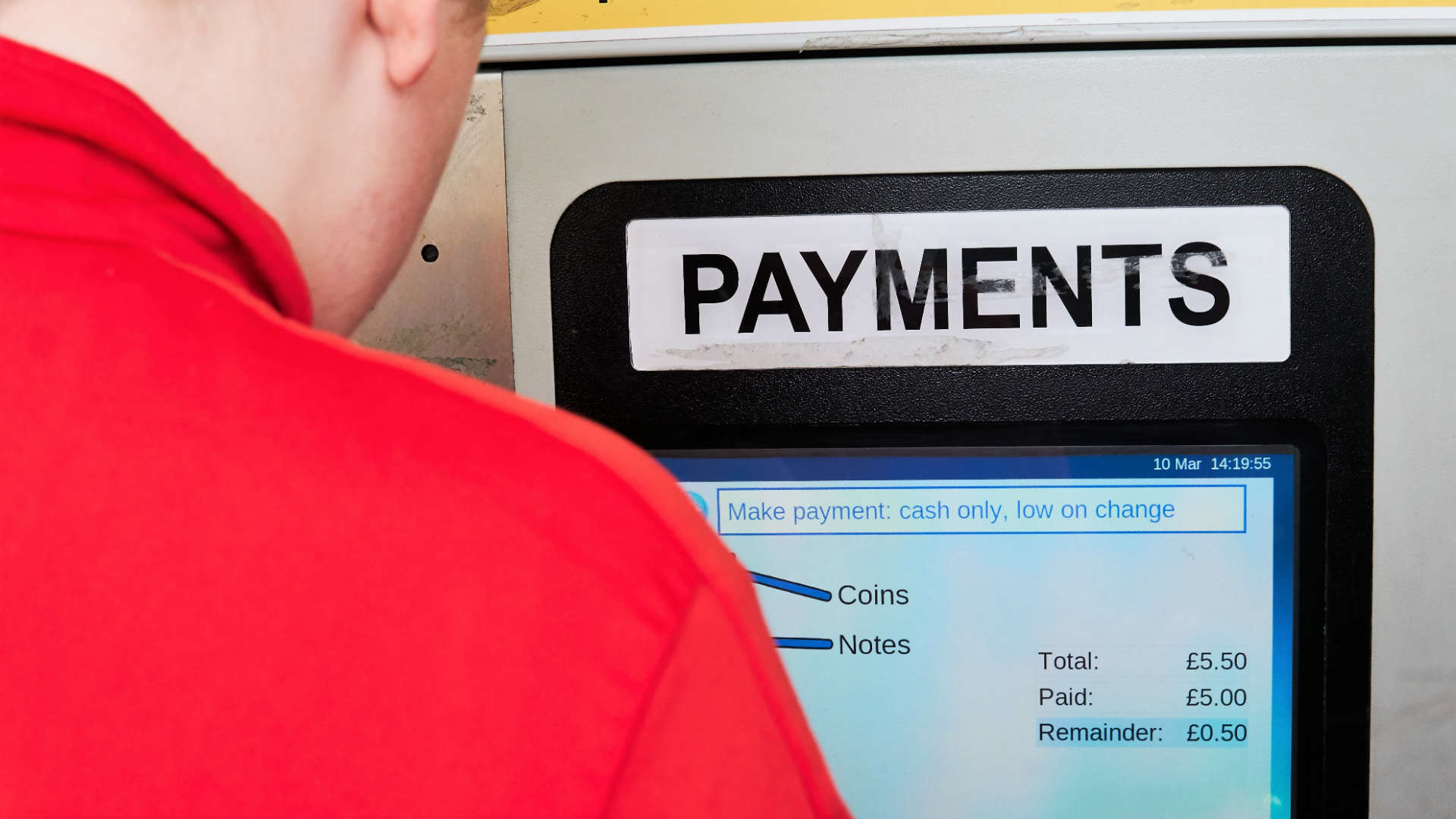 Driver paying for parking at NCP car park