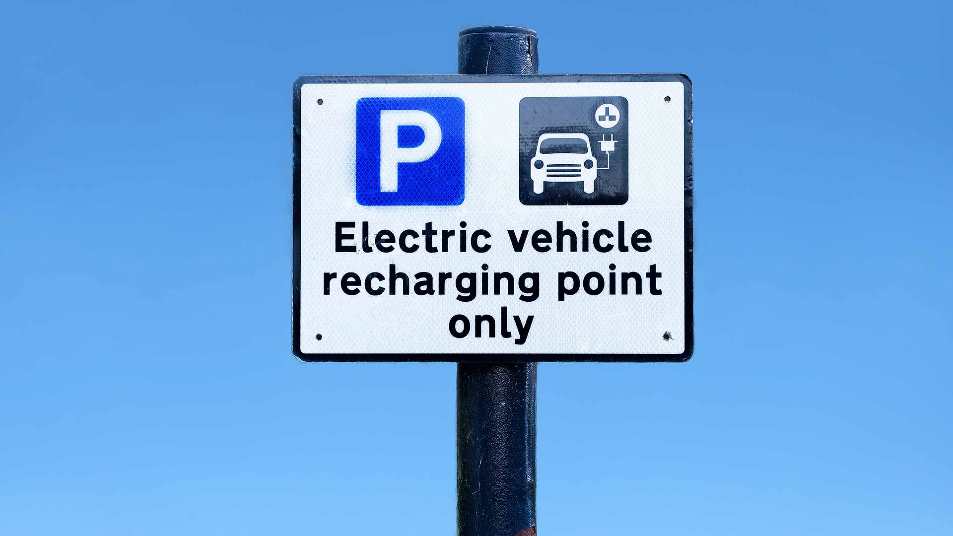 Electric vehicle recharging point warning sign