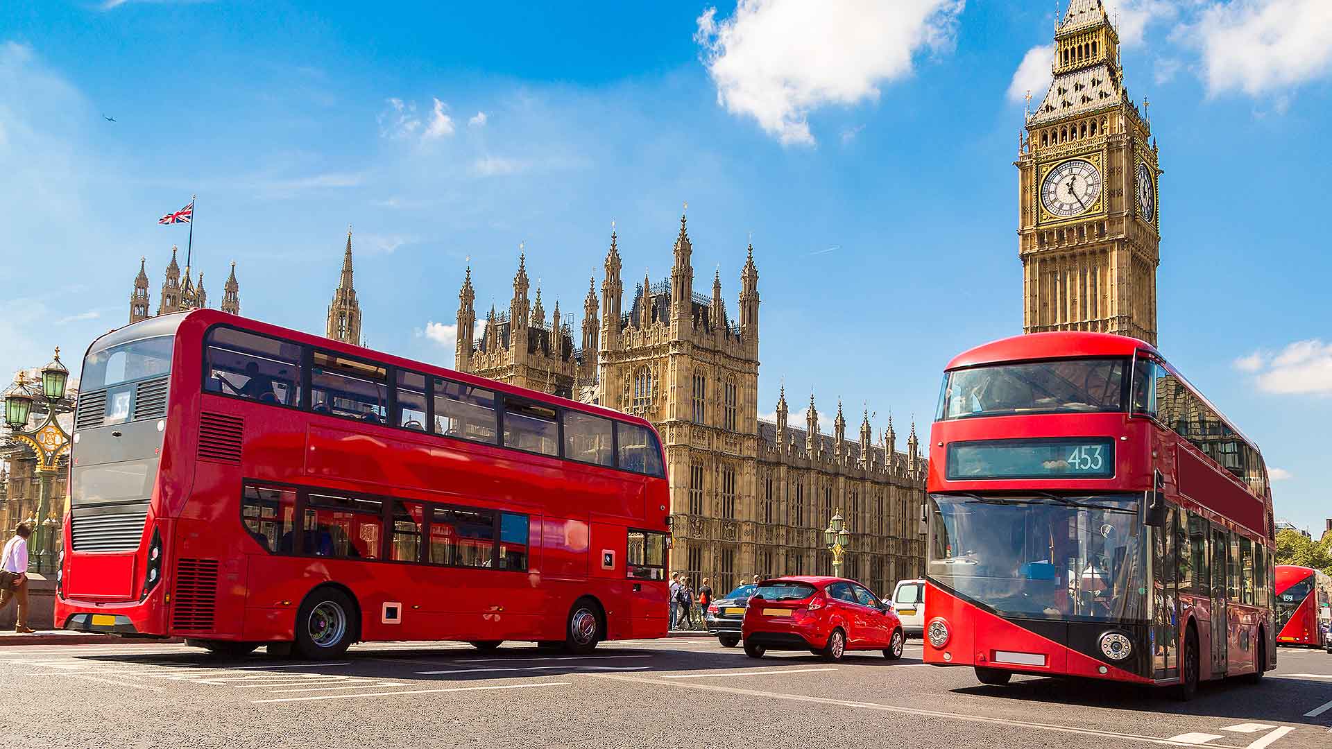 Cars and London buses on Westminster Bridge