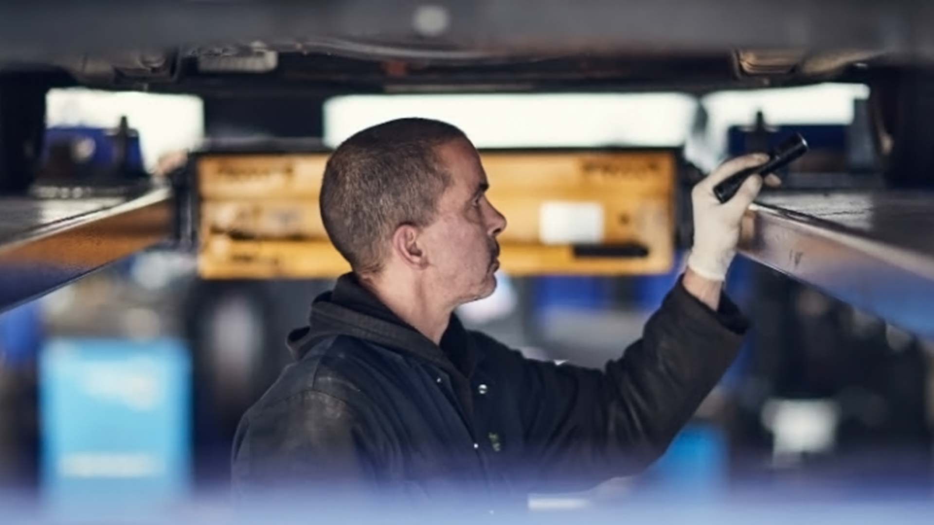 DVSA tester carrying out an MOT