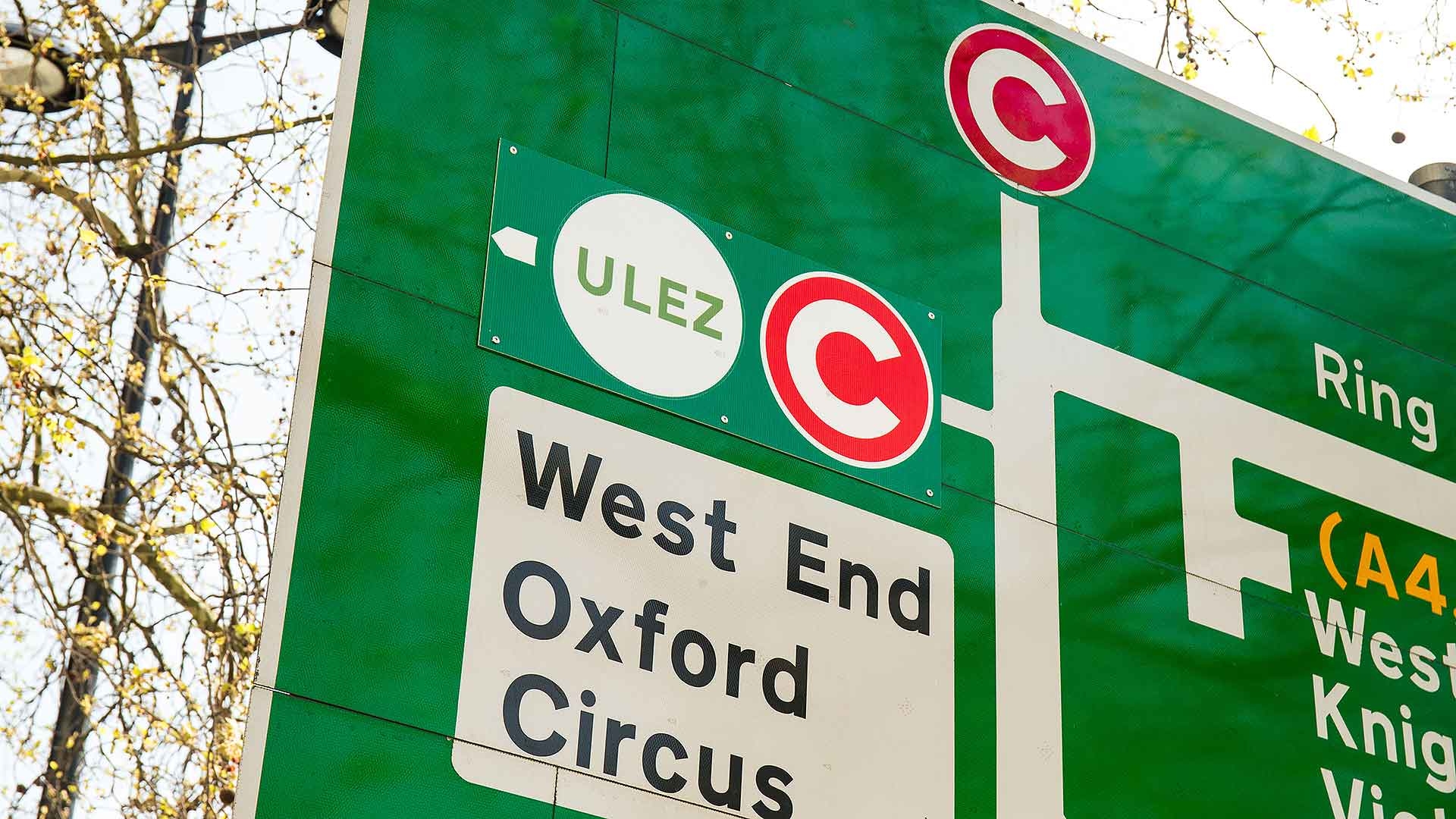 London ULEZ and Congestion Charge logo on road sign