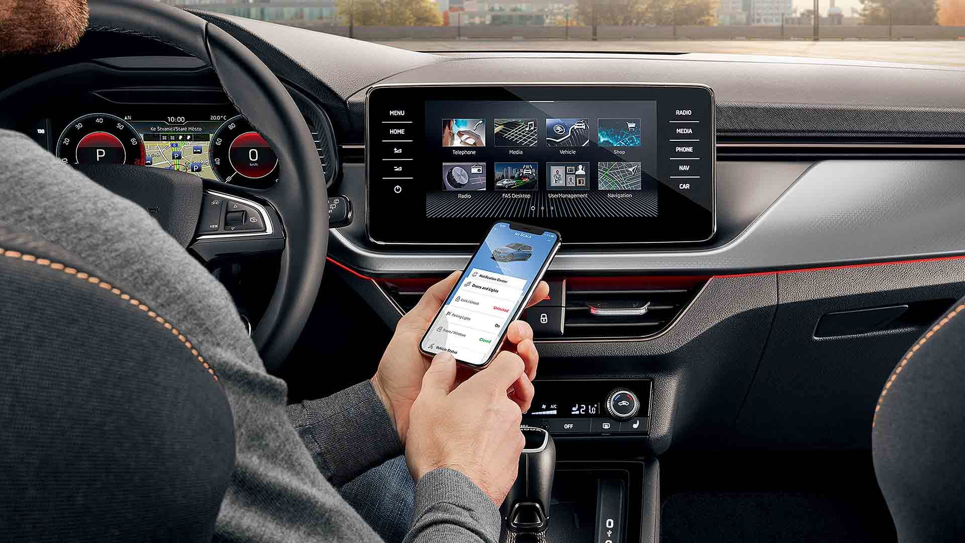 Motorist using a mobile phone behind the wheel