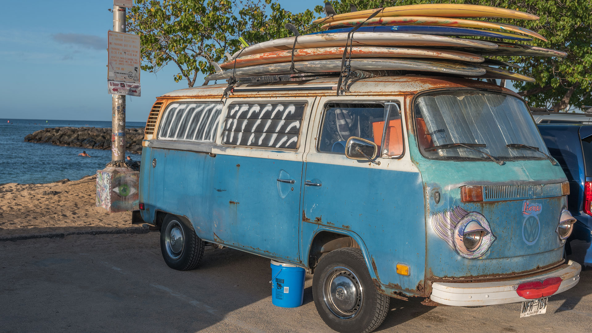 Most surfboards stacked on a car