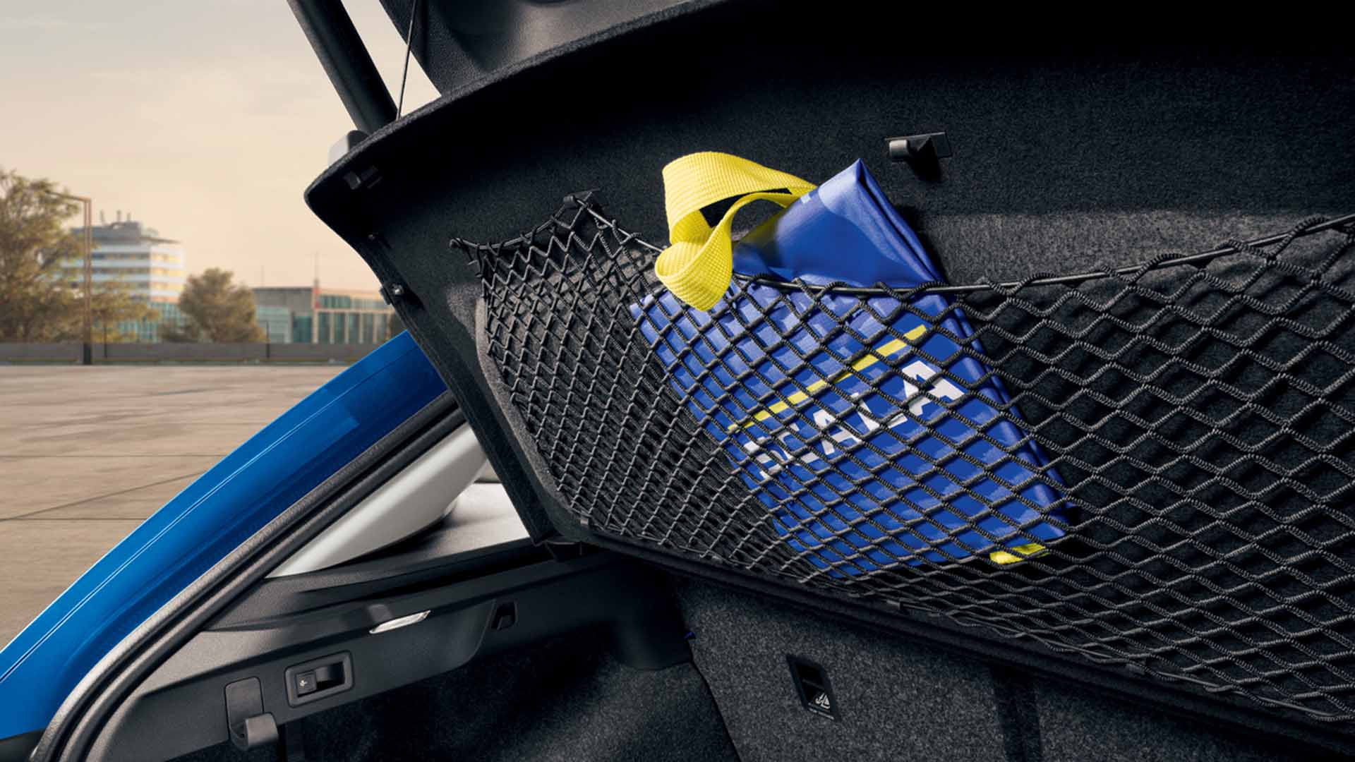 Net on the underside of the parcel shelf