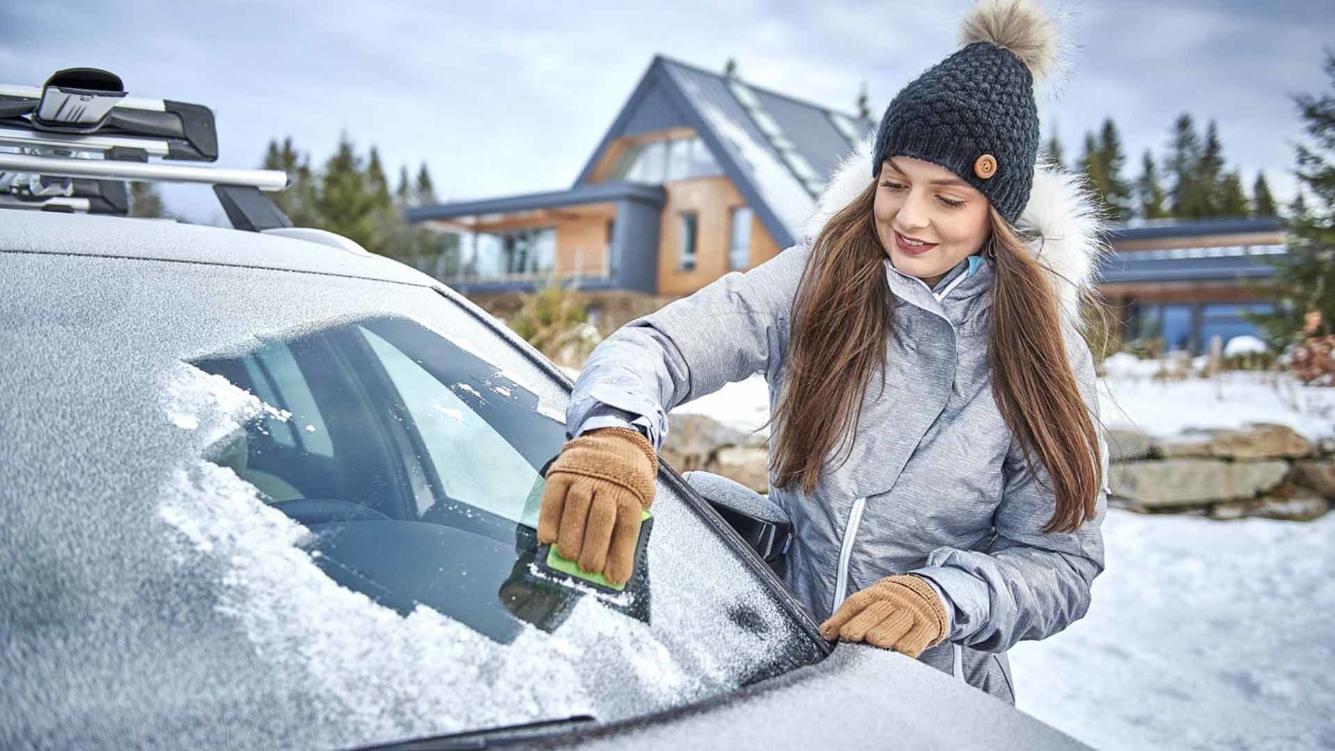 Clearing ice from Skoda windscreen